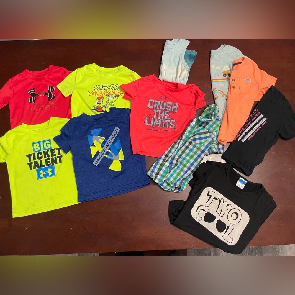 9 t shirts 1 tank top and 1 short sleeve button down